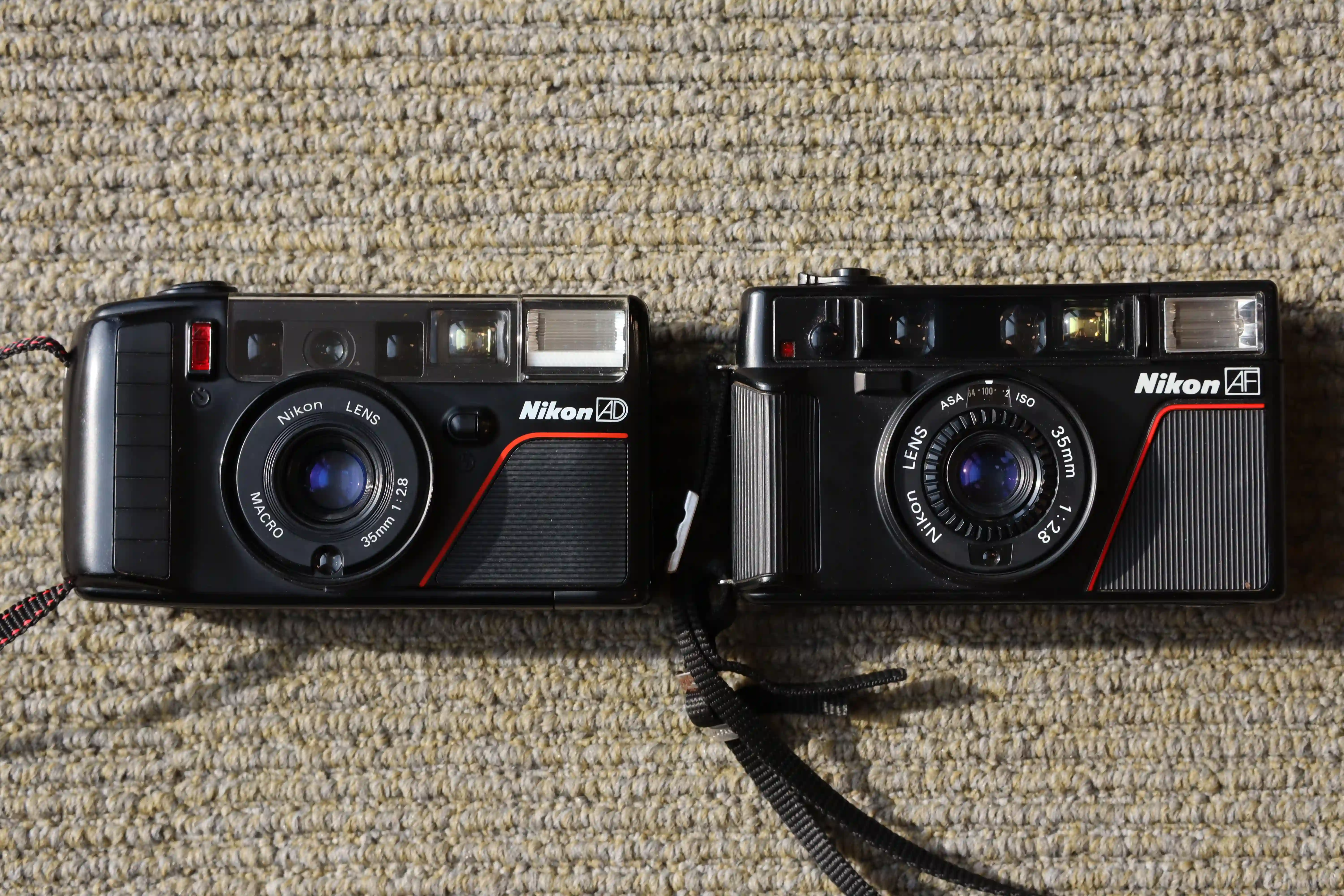 So sánh Nikon L35 AF/AD và L35 AF3/AD3: Mới Hơn Có Tốt Hơn?